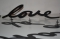 UMBRA - MANTRA LOVE - Szöveges fali dekoráció - Love is all you need - Fekete fém